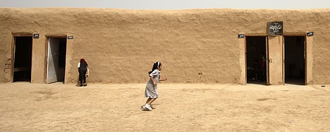 &lt;p&gt;In this photo taken on Tuesday, May 15, 2012, students rush to class at Alhambra elementary school, made from mud, in Khalis 50 miles (80 kilometers) north of Baghdad, Iraq. Millions of dollars in international aid to build and repair Iraq's dilapidated schools have for years gone unspent. Now, Iraq's government risks losing the funding as the World Bank weighs whether some of it would be better used in some of the poorest nations around the globe. (AP Photo/Khalid Mohammed)&lt;/p&gt;