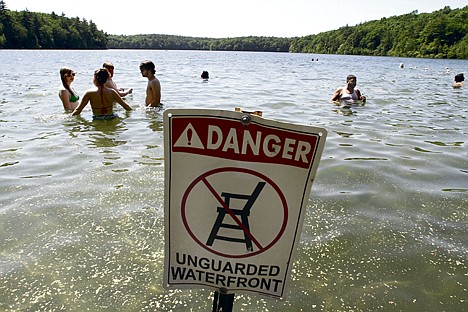Heavy rains limit access to famed Walden Pond