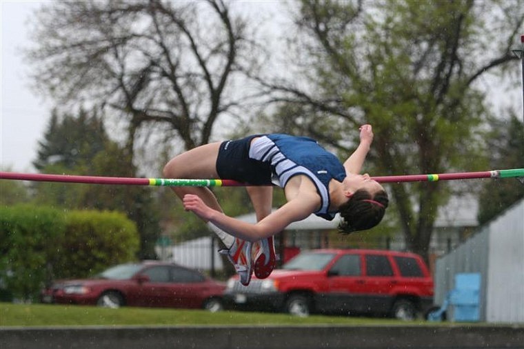 GLACIER&#146;S LEXY BOSCHEE attempts to clear the bar during the high jump competition on Friday at the Class AA state track meet at Memorial 
Stadium. Boschee won the event with a height of 5-4.