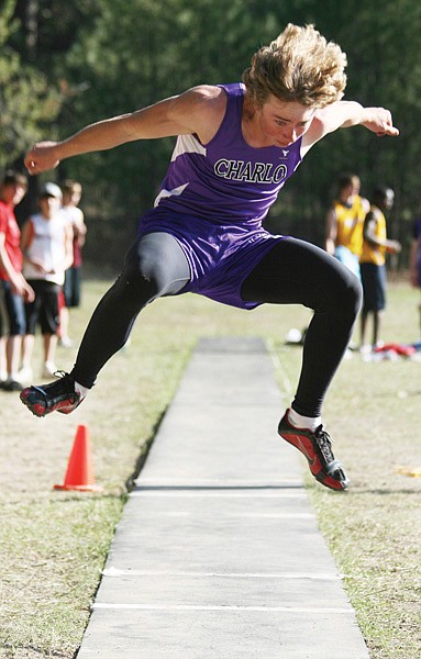 Isaac Rockwell of Charlo soars in the triple jump at the Thompson Falls Invitational on Thursday.