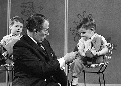 &lt;p&gt;In this April 5, 1962 file photo, TV personality Art Linkletter talks with 4-year-old Ronnie Glahn shows Art Linkletter his idea of how bad guys look, on Art's TV show in Hollywood, April 5, 1962 in Los Angeles. Linkletter, who hosted the popular TV shows &quot;People Are Funny&quot; and &quot;House Party&quot; in the 1950s and 1960s, died Wednesday, May 26, 2010 at his home in the Bel-Air section of Los Angeles. He was 97. (AP Photo/David F. Smith, file)&lt;/p&gt;