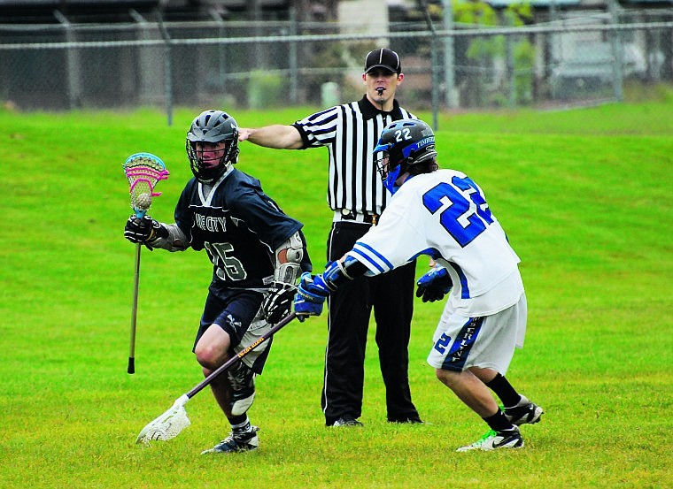 &lt;p&gt;Adam Marfice, left, of Lake City, tries to elude Andrew Rusin of Timberline.&lt;/p&gt;