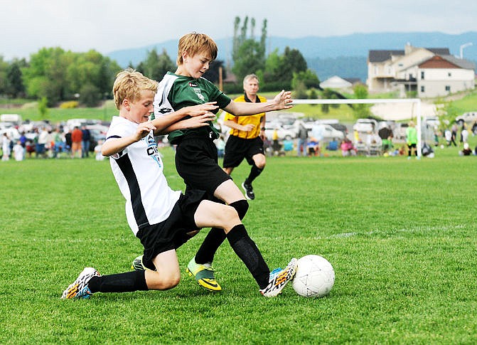 &lt;p&gt;Flathead Force's Daniel Camp, right, and Columbia Valley's Jake Swallow battle for the ball during a U-13 game of The Three Blind Refs tournament at Kidsports Complex on Saturday, May 30, 2015 in this file photo. (Aaric Bryan/Daily Inter Lake)&lt;/p&gt;