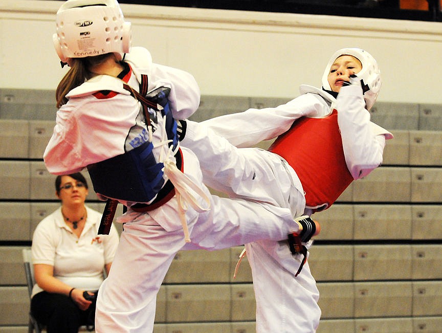 &lt;p&gt;Kennedy Kanter, left, and Cheyenne Aundt kick each other during a bout at the Montana State Tae Kwon Do Championship at Flathead High School on Saturday. (Aaric Bryan/Daily Inter Lake)&lt;/p&gt;