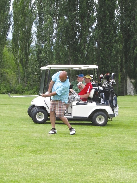 Eddie Blanchett of the Seattle area fires at the pin on hole No. 2. He was a friend of a friend of  friend of Sunland Invitational founder Dick Brown. Now he's Brown's friend too.