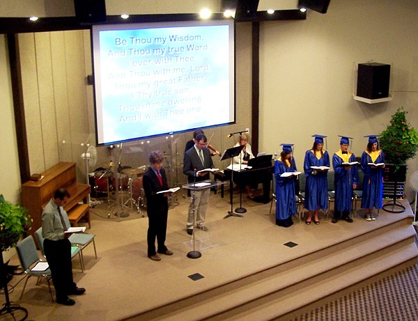 The graduates read from the Bible during the ceremony.