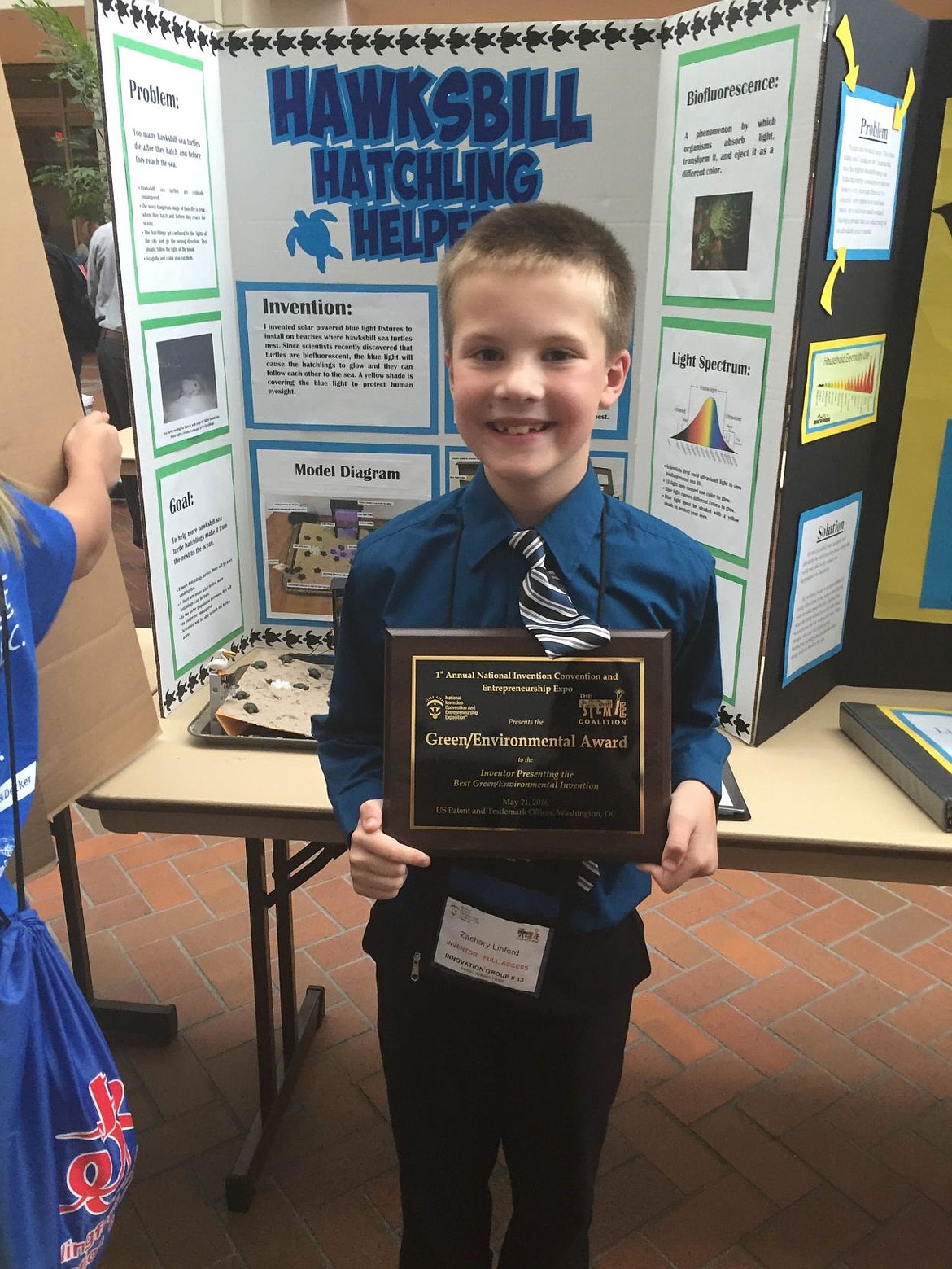 &lt;p&gt;Skyway Elementary third-grader Zachary Linford, 8, shows off the Green/Environmental Award he received for his &#147;Hawksbill Hatchling Helper&#148; invention during the National Invention Convention in Washington, D.C., May 20 and 21.&lt;/p&gt;