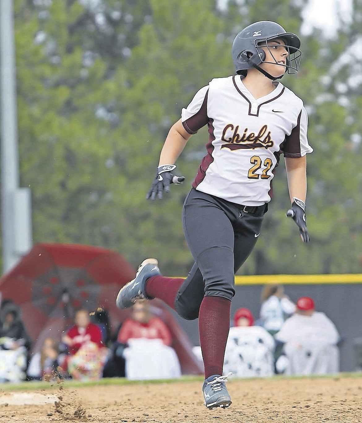 Moses Lake's Aubrey Rowland rounds second base against Yelm in the first round of the 4A state softball tournament Friday at Merkel Sports Complex in Spokane.