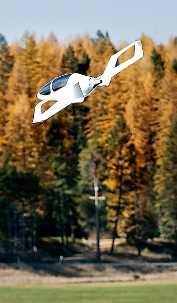 A provided photo of the Synergy one quarter scale model in flight.