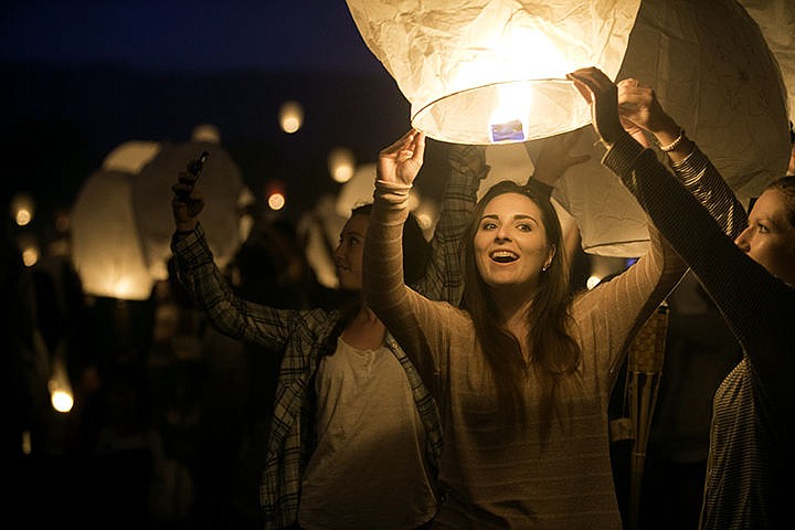 &lt;p&gt;Alessia Sarale prepares to let her lantern take flight at the 2nd annual Lantern Fest Saturday at the Stateline Stadium Speedway in Post Falls. Thousands of biodegradable lanterns filled the night sky after sunset for the family-friendly event.&lt;/p&gt;