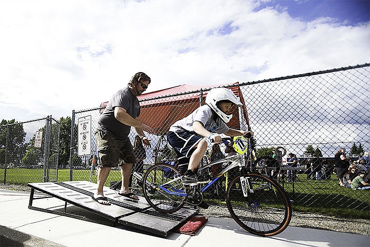 &lt;p&gt;Kayden Wade, 9, tests his bike skills at the Cherry Hill BMX Booth that provided a simulated BMX starting gate for people to try out at the Spring Fling event Wednesday.&lt;/p&gt;