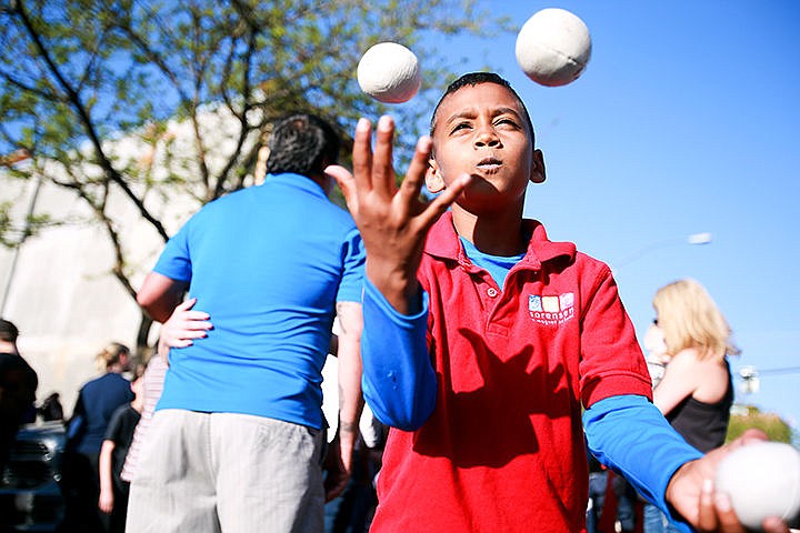 &lt;p&gt;Sorensen student, Cason Miller, 8, concentrates on his juggling skills on Sherman Avenue in Coeur d&#146;Alene on Friday. A piece of the avenue was blocked off for the students to perform a flash mob dance during the ArtWalk event.&lt;/p&gt;