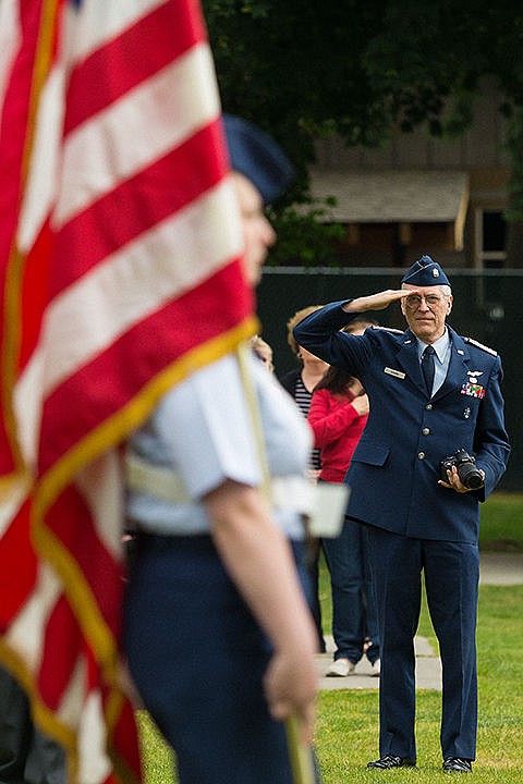 &lt;p&gt;Capt. Paul Brand, with the Civil Air Patrol&#146;s Coeur d&#146;Alene squadron, salutes the American Flag during a presentation of the colors near Hayden Lake.&lt;/p&gt;