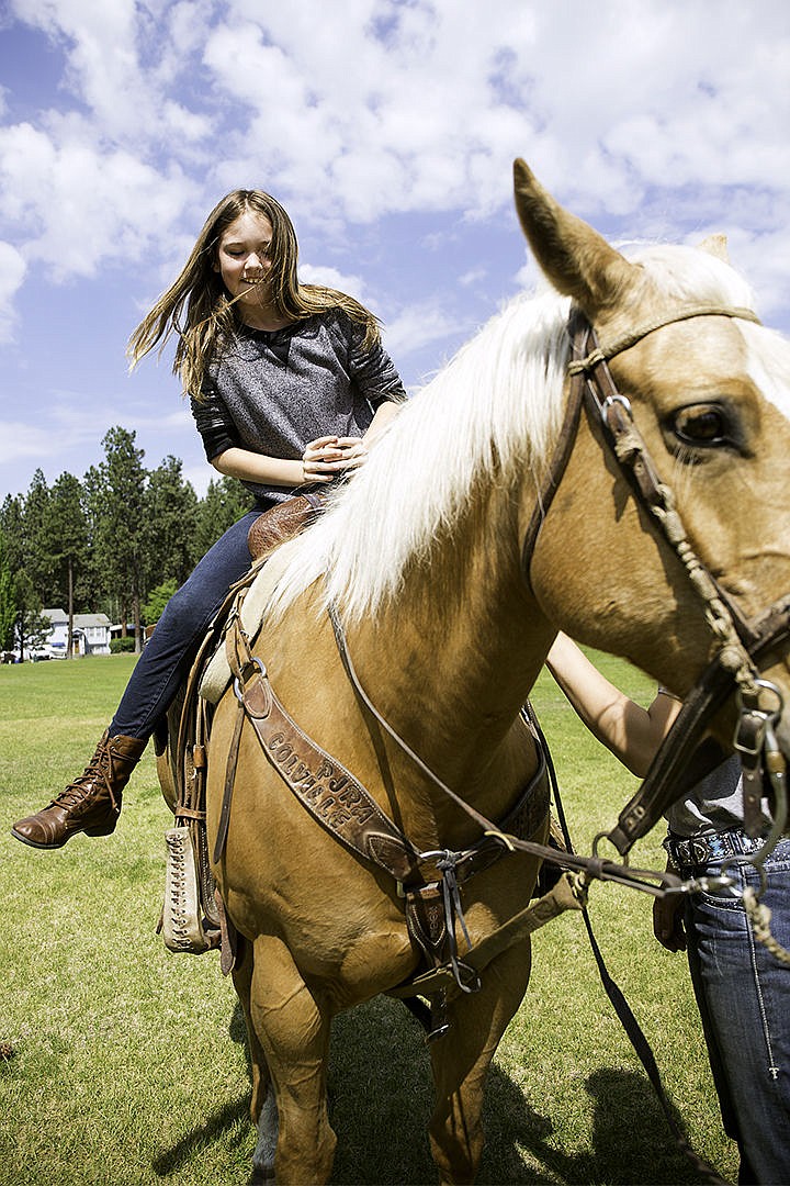 &lt;p&gt;Ponderosa Elementary student Kaylee Leffler, 10, settles into the saddle of a horse at the 4th grade Rendezvous Thursday at the Ponderosa Elementary school in Post Falls. Students experienced different wild west themed stations teaching them the history of Idaho culture.&lt;/p&gt;