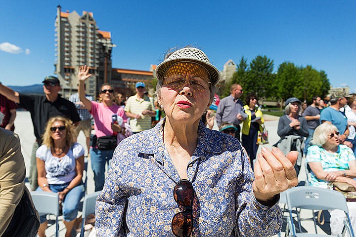 &lt;p&gt;Ruth Townsend, of Hayden, sings along with a Christian song during a National Day of Prayer gathering of about 300 on Thursday at McEuen Park in Coeur d&#146;Alene.&lt;/p&gt;