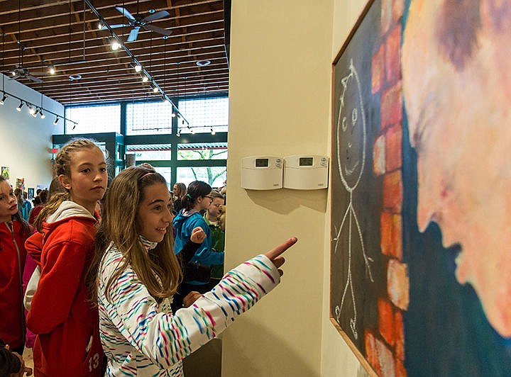 &lt;p&gt;Chloe Hanna, a fifth-grade student at Sorensen, looks at Mel McCuddin's piece &quot;Owl&quot; at the Art Spirit Gallery. The art was made available through a private donation by a parent of a Sorensen student.&lt;/p&gt;