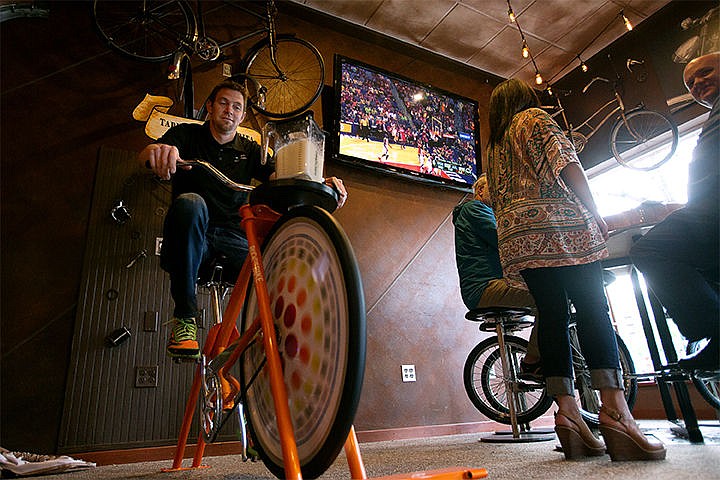 &lt;p&gt;Tony Parks makes a margarita through the pedals of a bike blender at newly opened CDA Tap House in downtown Coeur d&#146;Alene.&lt;/p&gt;