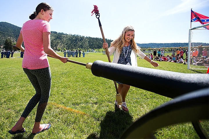 &lt;p&gt;Eighth grade students Darian Clack, left, and Maya Hippenstiel load a simulated canon in a cooperative learning lesson at Canfield Middle School Thursday in Coeur d&#146;Alene. Teams raced to load and shoot their simulated weapon earning and losing points as they followed a hands on process.&lt;/p&gt;