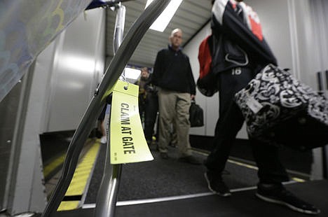 &lt;p&gt;In this Nov. 13, 2014 photo, Southwest Airlines passengers board an early morning originator flight for departure from a gate at Love Field in Dallas. Southwest Airlines wants to reduce complaints that families can&#146;?t find seats together because flights are so crowded.&#160;&lt;/p&gt;