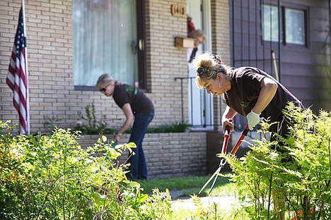 &lt;p&gt;GABE GREEN/Press&lt;/p&gt;&lt;p&gt;Kristin Ristic trims bushed for Polly Newberry of Coeur d&#146;Alene during the &#147;Rake and Run&#148; volunteering event Wednesday. Local volunteers associated with various organizations gathered to help seniors with yard maintenance.&lt;/p&gt;