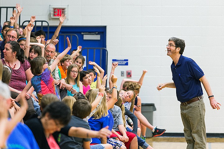 &lt;p&gt;SHAWN GUST/Press&lt;/p&gt;&lt;p&gt;Poet Kenn Nesbitt interacts with students at Seltice Elementary School while working with the children to write a poem Friday during an assembly at the Post Falls school. The Spokane childrens' poem writer has published more than a dozen books and his works have appeared in several publications. Nesbitt travels to area schools to promote youth writing.&lt;/p&gt;