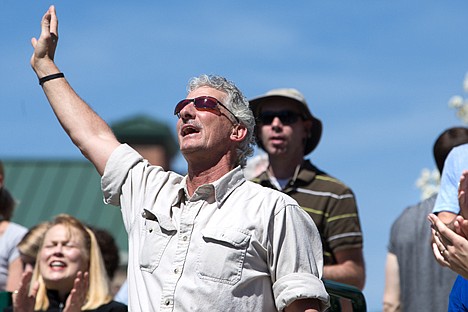 &lt;p&gt;GABE GREEN/Press&lt;/p&gt;&lt;p&gt;Coeur d&#146;Alene local Paul Torgy lifts his hand to the the sky during a song of worship Thursday at Coeur d&#146;Alene City Hall as members of the community gathered for a National Day of Prayer event. Thousands of christian organizations gathered around the county to worship together.&lt;/p&gt;