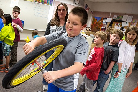 &lt;p&gt;GABE GREEN/Press&lt;/p&gt;&lt;p&gt;Conner Mulligan, 8, learns about centrifugal force by playing with a gyroscope in a Fernan Elementary classroom Tuesday afternoon. The Seattle Pacific Science Center taught lessons and set up exhibits at the school to teach kids about various aspects of science.&lt;/p&gt;