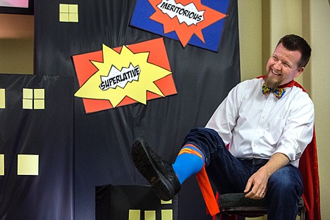 &lt;p&gt;GABE GREEN/Press&lt;/p&gt;&lt;p&gt;Lake City Junior Academy teacher, Geoff Heald shows off his Superman socks before being presented with a national 2014 Excellence in Teaching award by the Alumni Awards Foundation Friday. The award includes a medallion and a $2,000 gift.&lt;/p&gt;