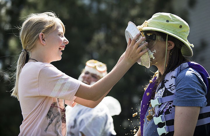 &lt;p&gt;LOREN BENOIT/Press Third-grader Becca Crippen, left, throws a pie in the face of Cornerstone Christian Academy teacher Jana Penland on Tuesday, May 3, 2016.&lt;/p&gt;