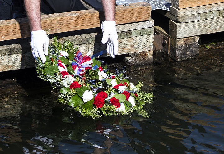 &lt;p&gt;LOREN BENOIT/Press Ed Hartz, of Veterans of Foreign Wars Post 889, places a wreath in the waters of Lake Coeur d'Alene during Memorial Day to honor those lost at sea.&lt;/p&gt;