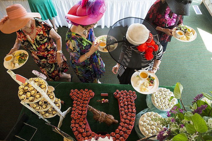 &lt;p&gt;LOREN BENOIT/Press Donning their Kentucky Derby hats, Blazen Divaz fill their colorful lunch plates with dessert before watching the race on Saturday, May 7, 2016 at the Hayden Lake Country Club.&lt;/p&gt;