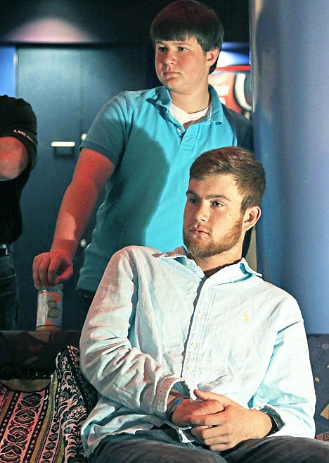 &lt;p&gt;Gatlin Stringer, 14, left, and his brother, Garrett, 20, visit Houston's M.D. Anderson Cancer Center, May 22.&lt;/p&gt;