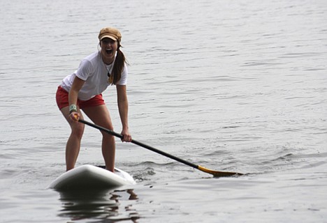 &lt;p&gt;Natalie Reighard, an employee of Coeur d'Alene Paddleboard, steers her board in from a ride on Lake Coeur d'Alene.&lt;/p&gt;