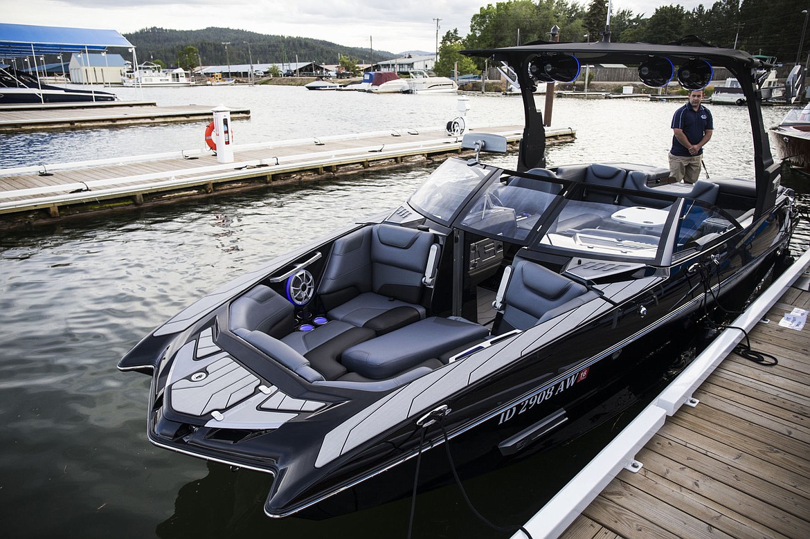 &lt;p&gt;A new M235 Malibu boat rests at the dock during a VIP unveiling of three new boats for guest to enjoy at the Hagadone Marine Center. The 23-feet 5-inches long, 398-horsepower boat features a new helm seat, upholstery and includes an integrated surf platform.&lt;/p&gt;