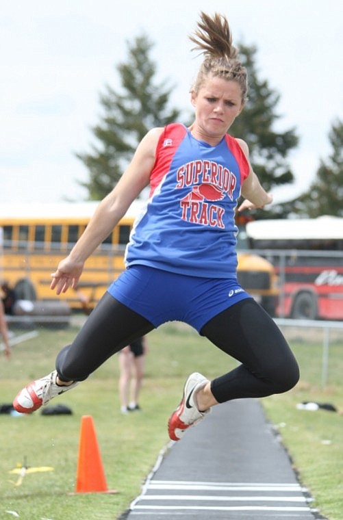 Shelby Cooper soars in the long jump at the Divisional Track Meet in Missoula. Cooper placed in the event and will be moving onto the state meet in Laurel.