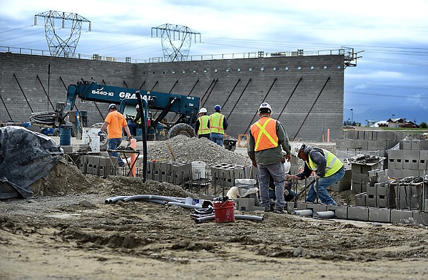 &lt;p&gt;Construction crew members work on the masonry of the new Cabela's building on Friday morning, May 31, in Kalispell. (Brenda Ahearn/Daily Inter Lake)&lt;/p&gt;