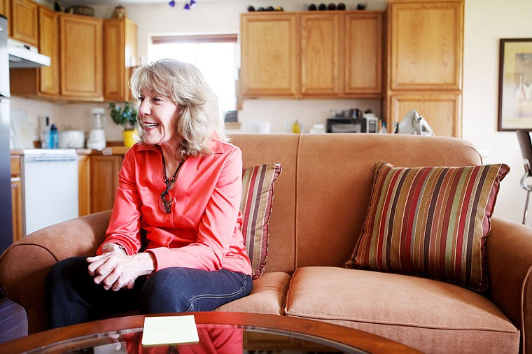 &lt;p&gt;At her home in Kalispell, Judi Fenton smiles Monday afternoon while talking about traveling the world as an international education consultant. May 20, 2013 in Kalispell, Montana. (Patrick Cote/Daily Inter Lake)&lt;/p&gt;