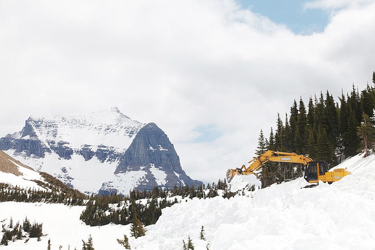 &lt;p&gt;An excavator clears snow Wednesday morning Near Logan Pass on Going to the Sun Road in Glacier National Park. May 29, 2013 in Glacier National Park, Montana. (Patrick Cote/Daily Inter Lake)&lt;/p&gt;