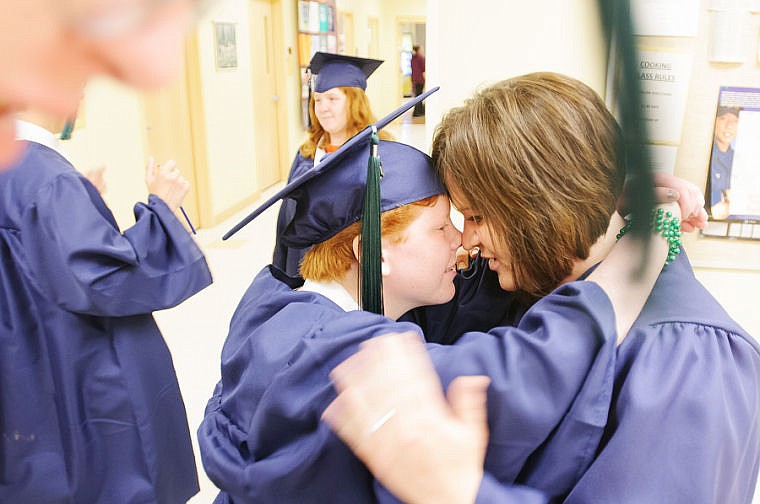 &lt;p&gt;Life skills teacher Lissy Boar, right, talks to her student Kayla Burns Saturday morning before the graduation ceremony at Glacier High School. June 1, 2013 in Kalispell, Montana. (Patrick Cote/Daily Inter Lake)&lt;/p&gt;