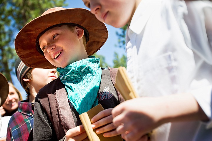 &lt;p&gt;Wyatt Cangelosi smiles before making a soft pouch Thursday during a Native American crafts station at Ponderosa Elementary.&lt;/p&gt;