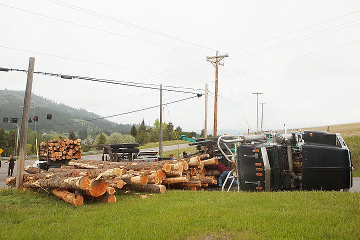 &lt;p&gt;A logging truck rolled over Friday morning while turning onto West Springcreek Road from U.S. 2 west of Kalispell. Friday, June 1, 2012 in Kalispell, Montana.&lt;/p&gt;