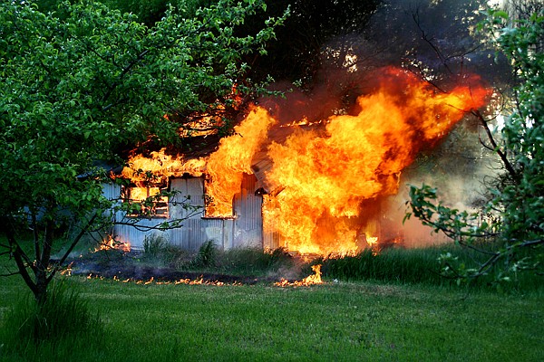 &lt;p&gt;Flames take over a small shed near 5th Avenue Apartments on Wednesday evening, May 30, in Kalispell.&lt;/p&gt;