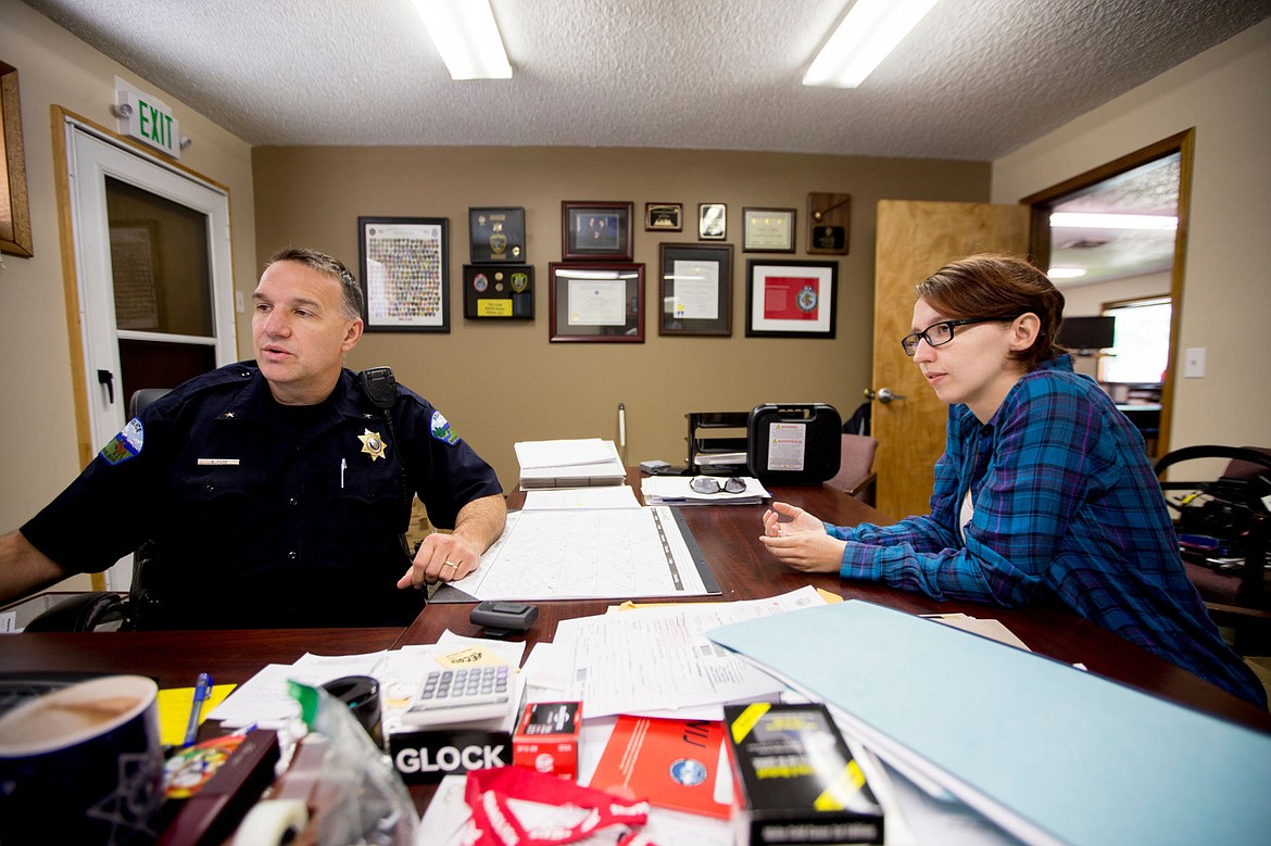 &lt;p&gt;Rathdrum Police Chief Kevin Fuhr shows Jamielyn Rupe photos from the car accident that took the lives of her mother and sister 20 years ago. Fuhr pulled the uninjured Rupe, then 18 months old, from the wreckage.&lt;/p&gt;