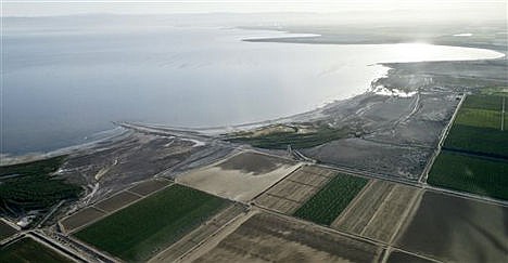 &lt;p&gt;Exposed lake bed of the Salton Sea dries out near Niland, Calif. San Diego and other Southern California water agencies will stop replenishing the lake in 2017, raising concerns that dust from the exposed lake bed will exacerbate asthma and other respiratory illness in a region whose air quality already fails federal standards.&lt;/p&gt;