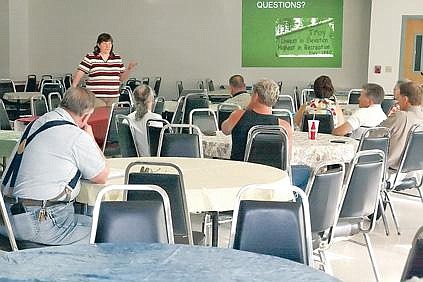 Brad Fuqua/The Western News Catherine LeCours of Montana DEQ answers questions Tuesday night in Troy.