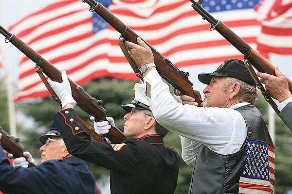 Military veterans Robert Radtke American Legion, Ron Smith Marine Corps League and Slim Ahrends VFW honor their fallen comrades with a ceremonial 21 gun salute, three volleys into the sky Monday at Polson's Lakeview Cemetery.