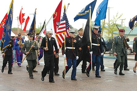 Honor detail lead the way during the Ronan Memorial Day Parade.