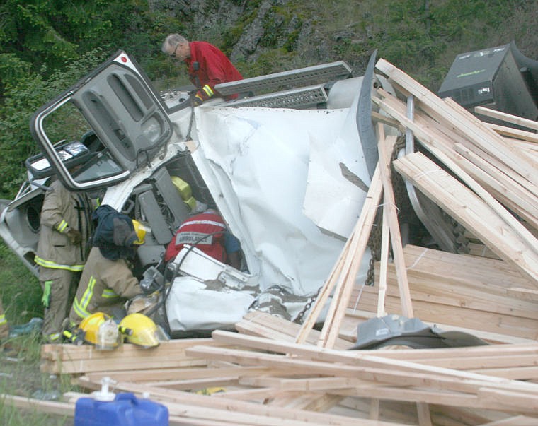 &lt;p&gt;A tractor-trailer hauling lumber rolled over at the Perma Curves Monday. The driver had to be extracted from the vehicle but was conscious and alert.&lt;/p&gt;