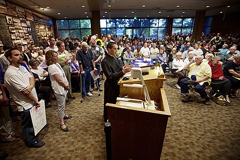 &lt;p&gt;Father Dennis Gordon, who opposed an anti-discrimination ordinance, discusses logical approaches in determining the need for one before the Coeur d'Alene City Council Tuesday. The ordinance passed 5 to 1.&lt;/p&gt;