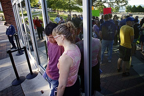 &lt;p&gt;Shane Duffy and Dotty Quade pray outside of the Coeur d'Alene Public Library community room where the city council was listening to public comment Tuesday regarding the non-discrimination regulations ordinance being considered.&lt;/p&gt;